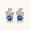 Sterling silver stud earrings with four-leaf clover design featuring small crystals above round moissanite stones