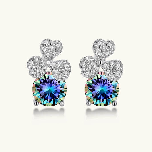 Sterling silver stud earrings with four-leaf clover design featuring small crystals above round moissanite stones