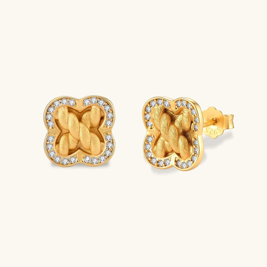 Gold-plated 925 silver clover stud earrings with brushed braid center and CZ stone border, 12mm, push-back closure.