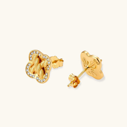 Gold-plated 925 silver clover stud earrings with brushed braid center and CZ stone border, 12mm, push-back closure.