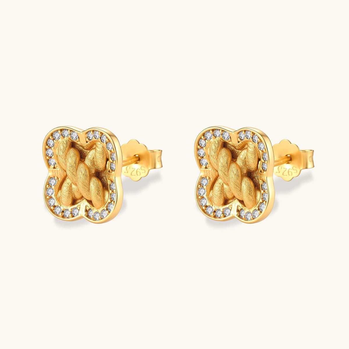 Gold-plated 925 silver clover stud earrings with brushed braid center and CZ stone border, 12mm, push-back closure.