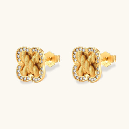 Gold-plated 925 silver clover stud earrings with brushed braid center and CZ stone border, 12mm, push-back closure.
